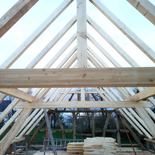 Construction d'une maison traditionnelle alsacienne dans le Sundgau, en colombages avec Dattler