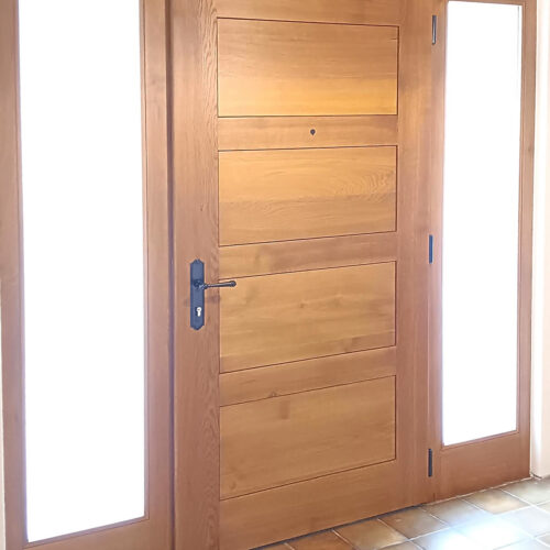 Porte d'entrée bois massif pleine